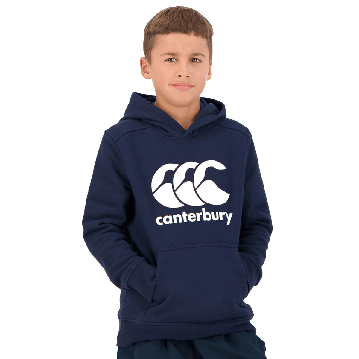 A young boy wearing a Canterbury Anchor Hoodie in navy blue with fleece lining and a logo stands facing forward.