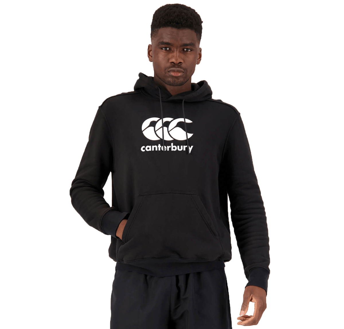A man wearing a Canterbury Anchor Hoodie, featuring fleece lining, a front pocket, and the Canterbury logo across the chest, stands against a plain white background.