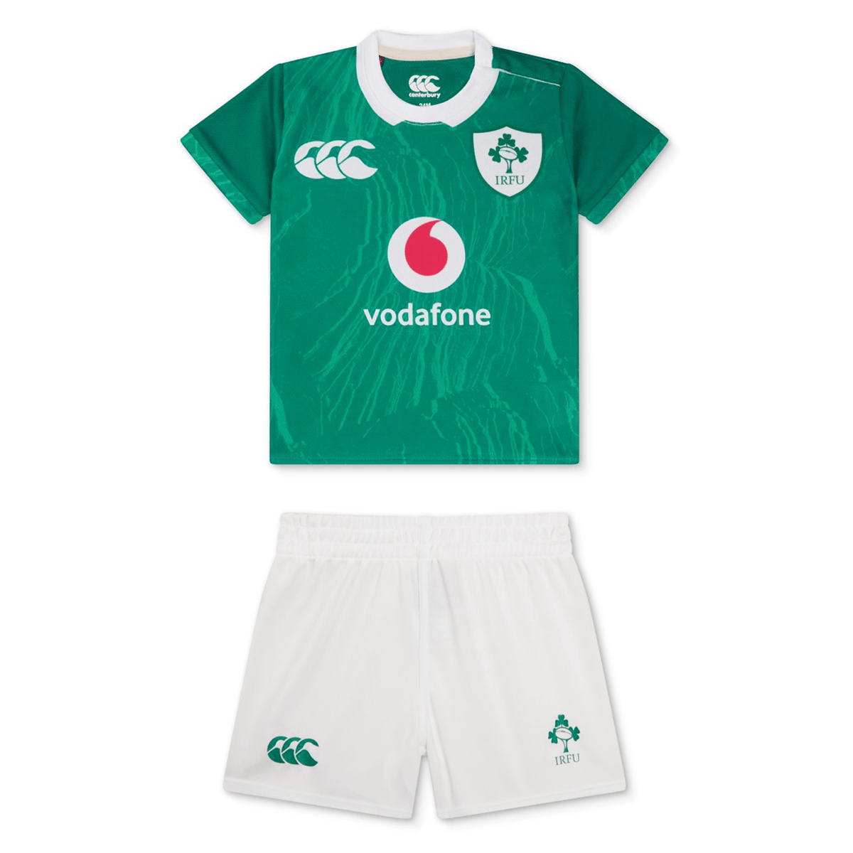 The Infant Ireland 24 Home Pack by Canterbury includes a green rugby jersey with IRFU and Vodafone logos, designed by Canterbury, plus white shorts showcasing the iconic IRFU logo.