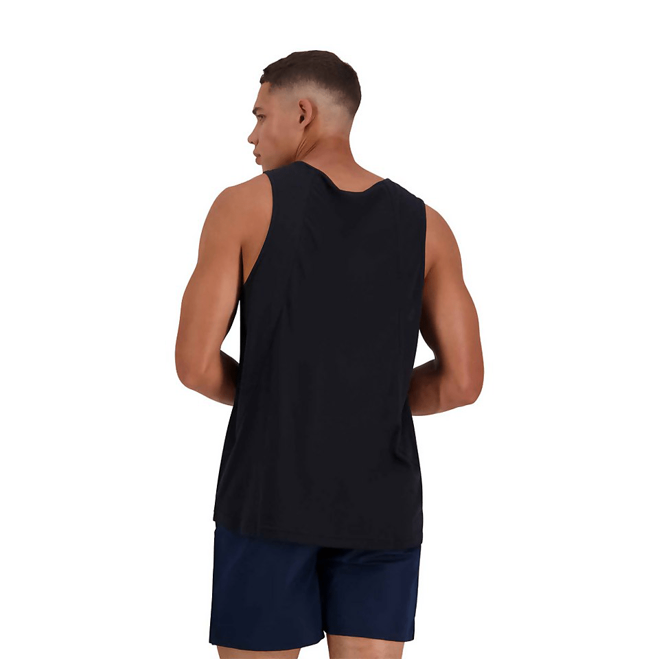 The back view of a man wearing a black tank top with Canterbury&#39;s Canterbury Tempo Vapodri Singlet technology.