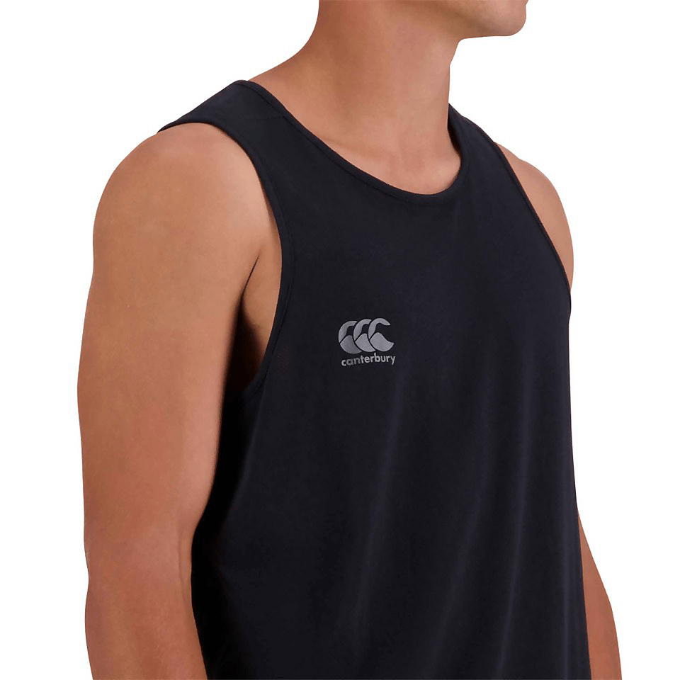 A man wearing a Canterbury Tempo Vapodri Singlet made from recycled polyester, featuring VapoDri technology.