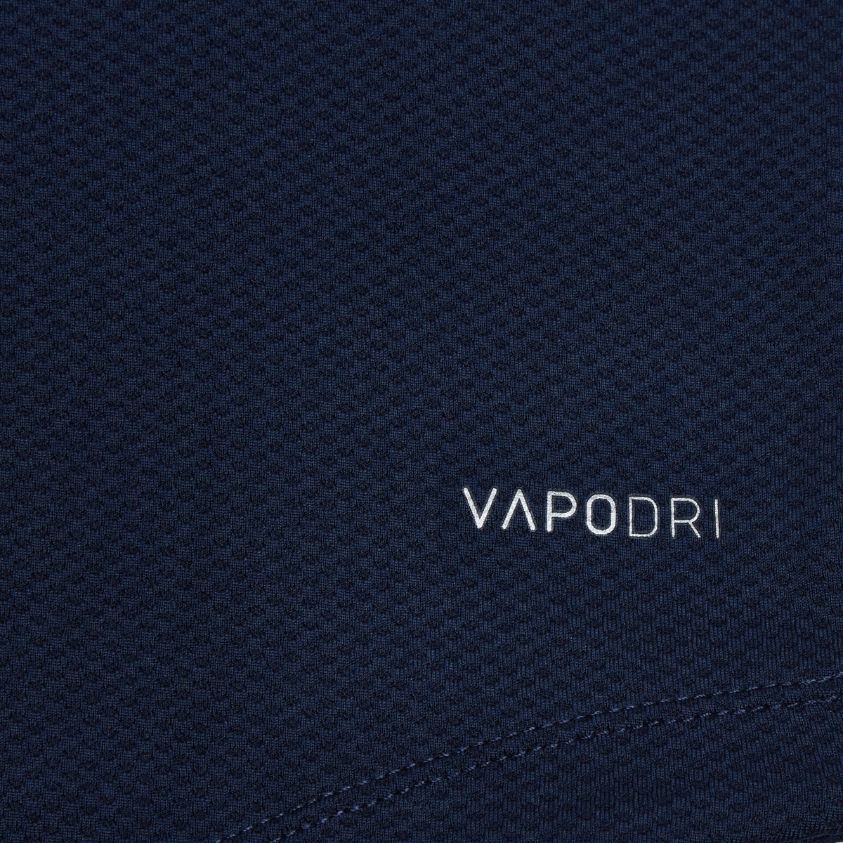 A close up of a Canterbury Elite Training Tee with the word vapodri on it.