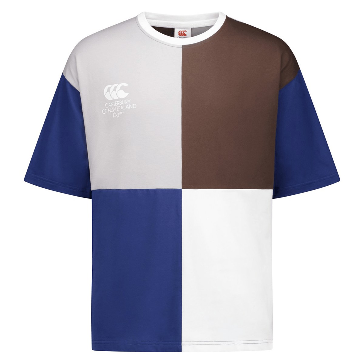 The Canterbury Harlequin Block T-Shirt, featuring large color blocks in blue, white, brown, and gray with an eye-catching asymmetric design and the Canterbury of New Zealand logo on the chest.
