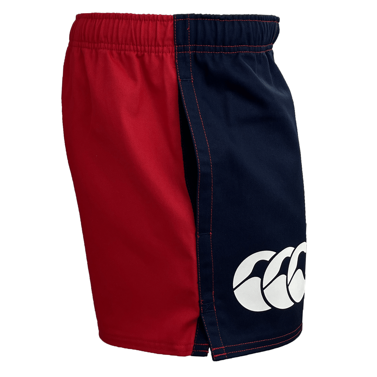The red and navy Canterbury Harlequin Drill Shorts include an elastic waistband and showcase a white logo on the navy side.