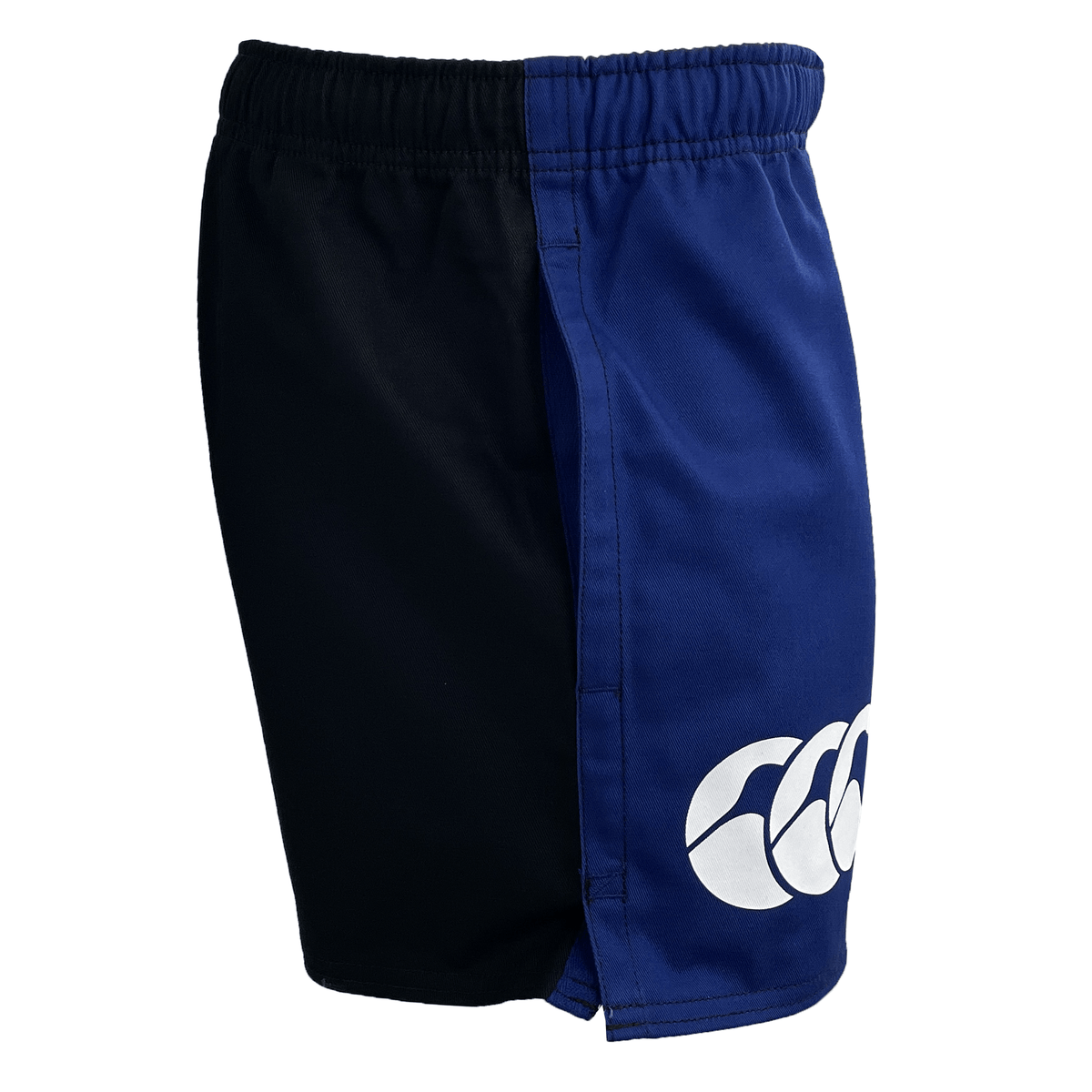 The Canterbury Harlequin Drill Shorts by Canterbury boast a unique two-tone style, displaying black on one side and blue on the other. Crafted from sturdy cotton drill fabric, these shorts are highlighted with a white logo located on the blue area near the hem.