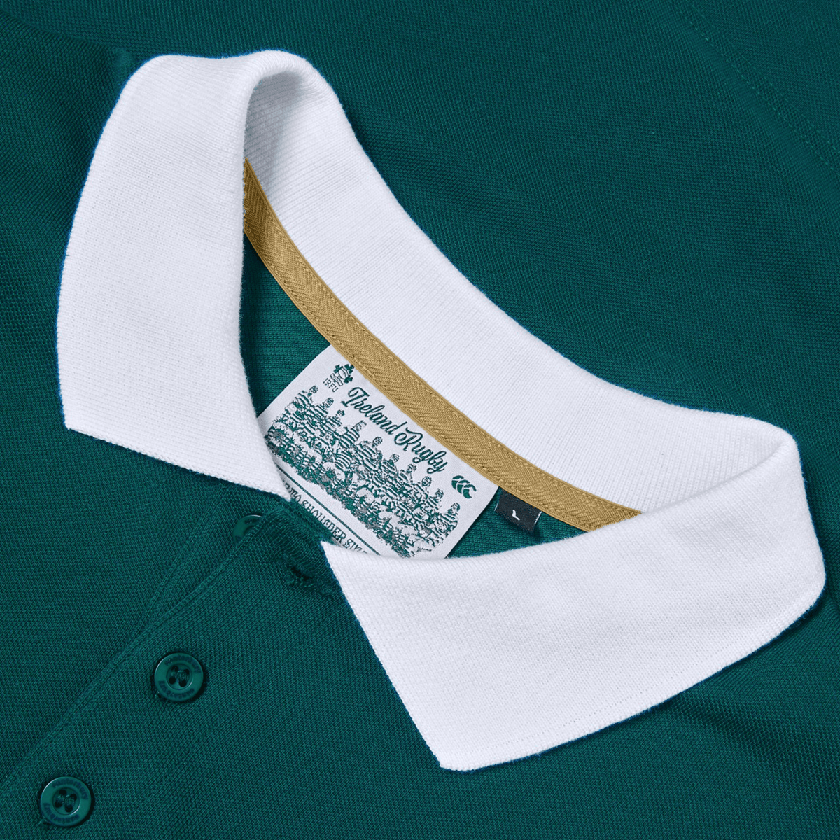Ireland 150th Anniversary Polo by Canterbury: A green polo shirt with a white collar and three buttons, featuring the "IRFU 150 Years" garment label near the neckline—ideal for rugby fans.