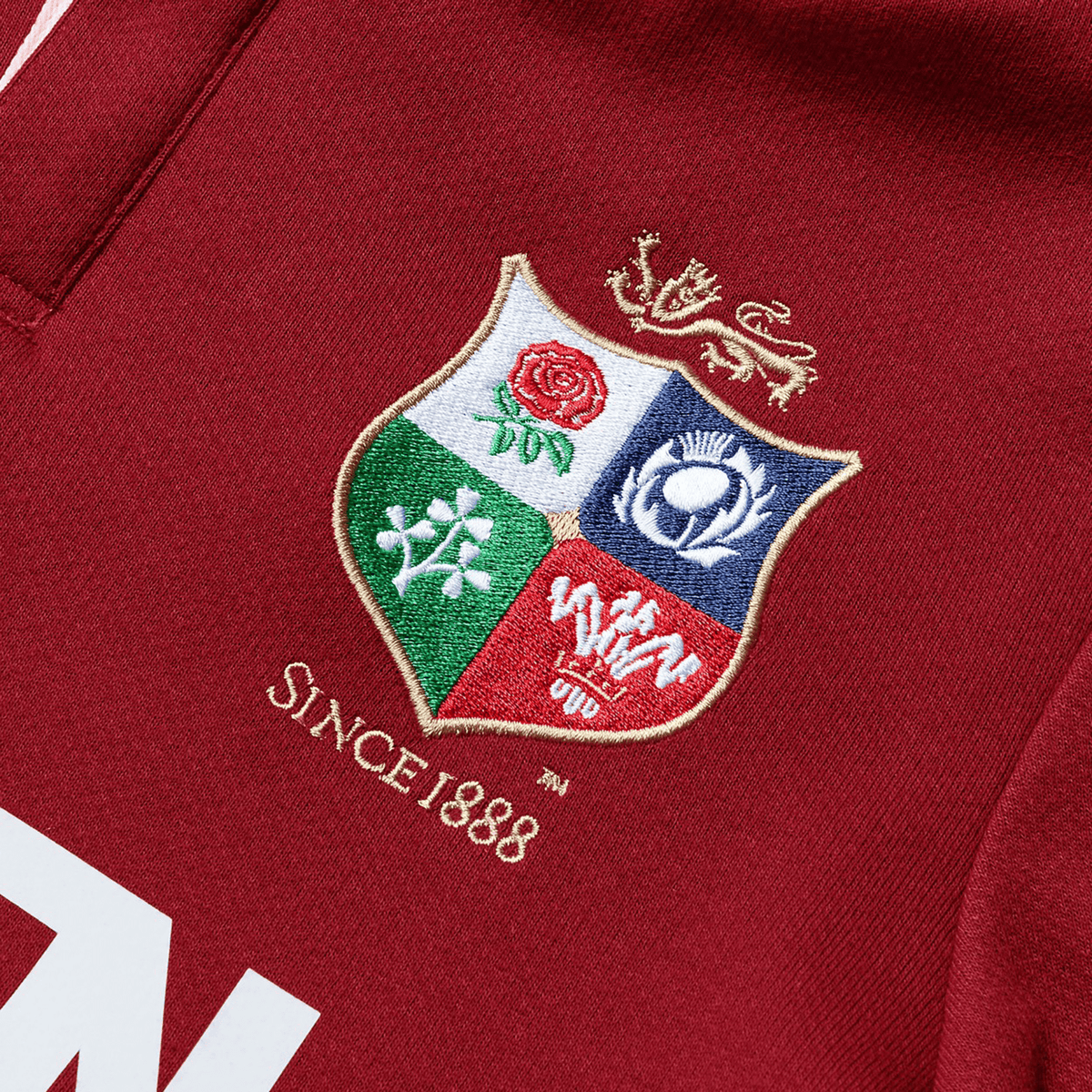 The Youth British &amp; Irish Lions 2025 Long Sleeve Classic Jersey by Canterbury features a detailed embroidered crest with &quot;Since 1888&quot; and is made from red, moisture-wicking fabric, ensuring comfort and style for young fans.
