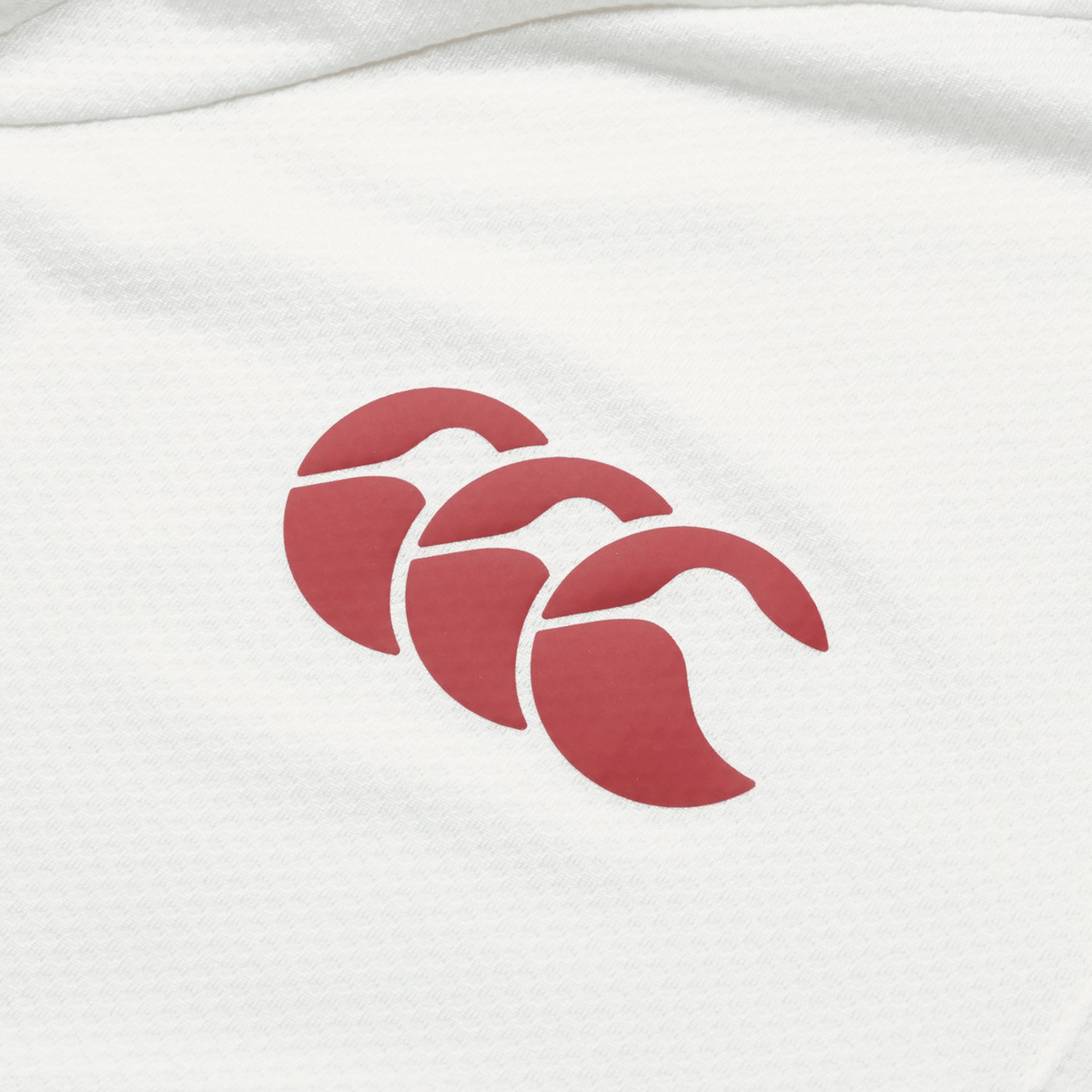 White breathable wicking fabric featuring a red three-headed Canterbury logo, ideal for the British &amp; Irish Lions 25 Poly Polo by Canterbury.