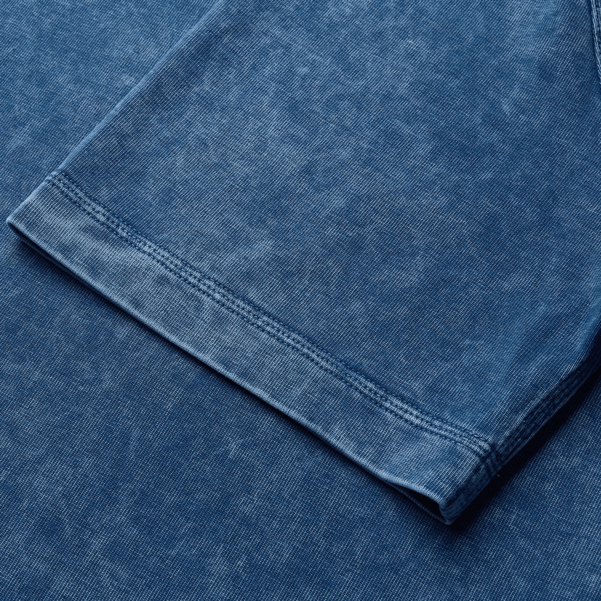 A detailed shot of the British &amp; Irish Lions 25 Heritage Tee by Canterbury, showcasing intricate stitching, crafted from organic cotton for sustainable style.