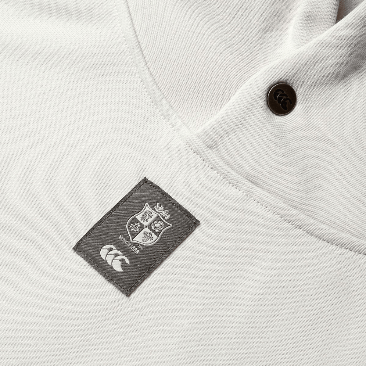 Close-up of a white Canterbury rugby hoodie with a logo featuring a shield and "Since 1888," capturing the legacy of the British &amp; Irish Lions, specifically showcasing the British &amp; Irish Lions 2025 Outback Fleece Hoodie by Canterbury.