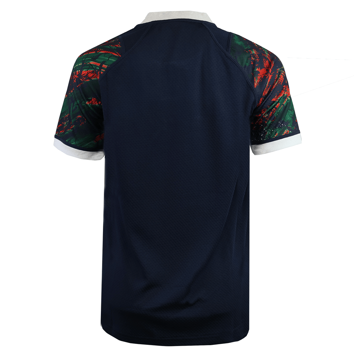 Back of the Youth British &amp; Irish Lions 2025 Warm Up Jersey by Canterbury shows short sleeves, navy moisture-wicking fabric, white collar/cuffs, and colorful abstract sleeve design.