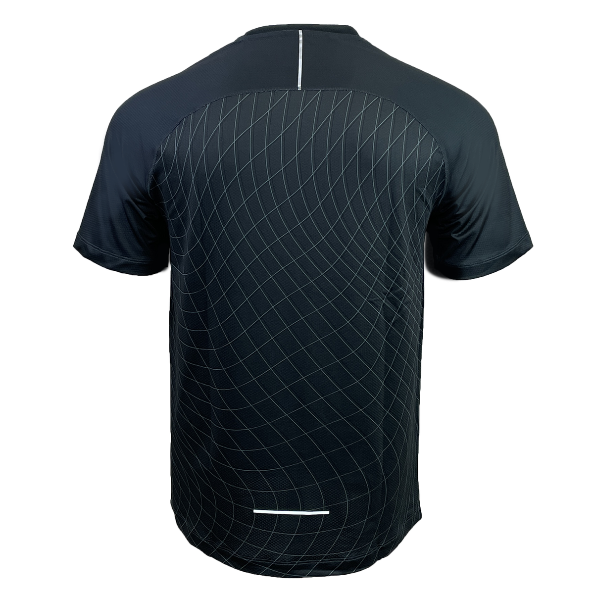 Back view of the Canterbury Tempo+ AOP Training Tee, a black performance piece with a subtle geometric line pattern, short sleeves, and reflective detailing by Canterbury.