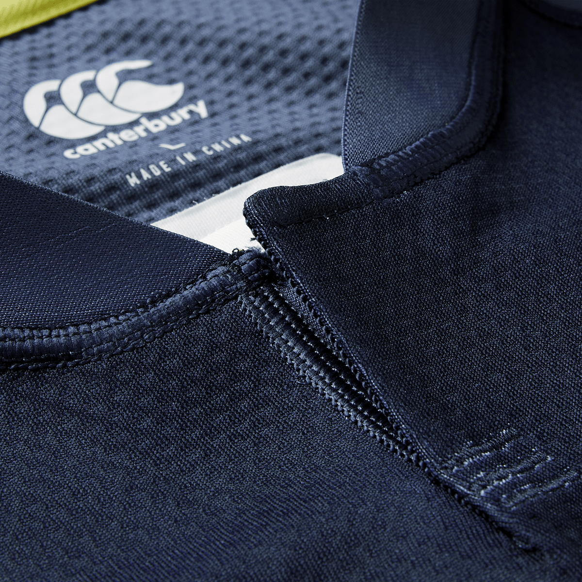 Close-up of the Ireland 26/27 Summer Tour "Indigo" Training Test Jersey by Canterbury, highlighting the collar, neckline stitching, and inner logo label—perfect for fans wanting that authentic Summer Tour style.
