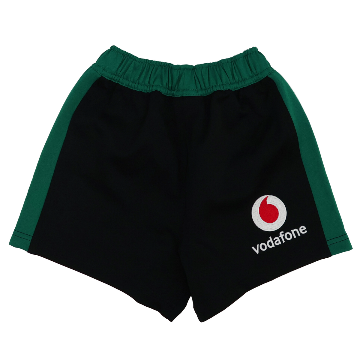 The Youth Ireland 25/26 Alternate Match Short by Canterbury features black fabric, green side panels, an elastic waistband, and a Vodafone logo on the right leg—perfect for young athletes.