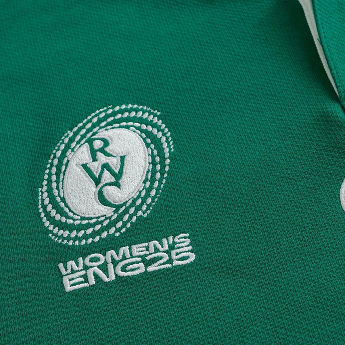The Ireland WRWC25 Classic Jersey by Canterbury features green fabric, a white "RWC" logo in a circular design, and "WOMEN'S ENG25" text below, designed for the Ireland Women's Rugby World Cup 2025.