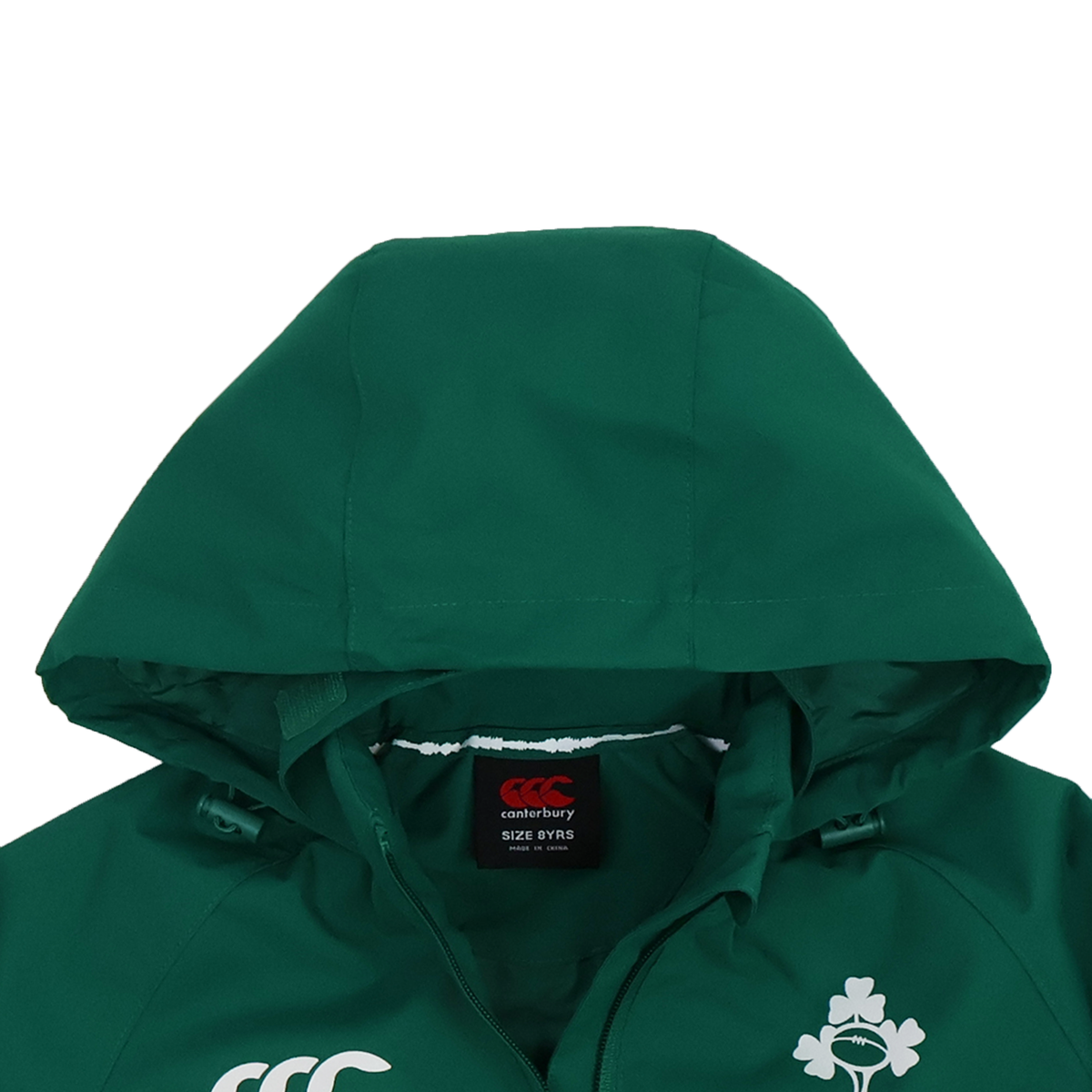 The Youth Ireland 25/26 Anthem Track Jacket by Canterbury features a green design with a white shamrock and Canterbury logo on the chest—a stylish way for young fans to show Irish pride.