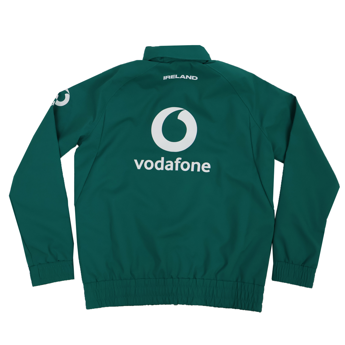 The Youth Ireland 25/26 Anthem Track Jacket by Canterbury features a &quot;vodafone&quot; logo on the back, &quot;IRELAND&quot; near the collar, and right sleeve logos—perfect for young Ireland rugby fans.
