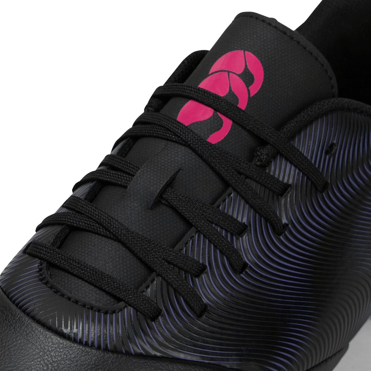 Close-up of a Canterbury Phoenix Genesis Team FG - Black/Verbena sports shoe with pink logo detailing, textured design, and a Synthetic Leather Forefoot.