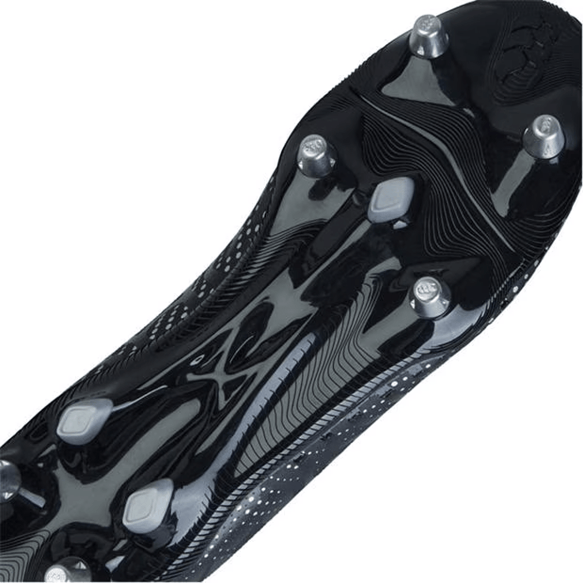 Close-up of the Canterbury Speed Infinite Team SG rugby boot in Black/Silver Metallic, highlighting its sole with six metal studs and sophisticated tread patterns engineered for optimal traction on soft ground, boosting speed and agility on the field.