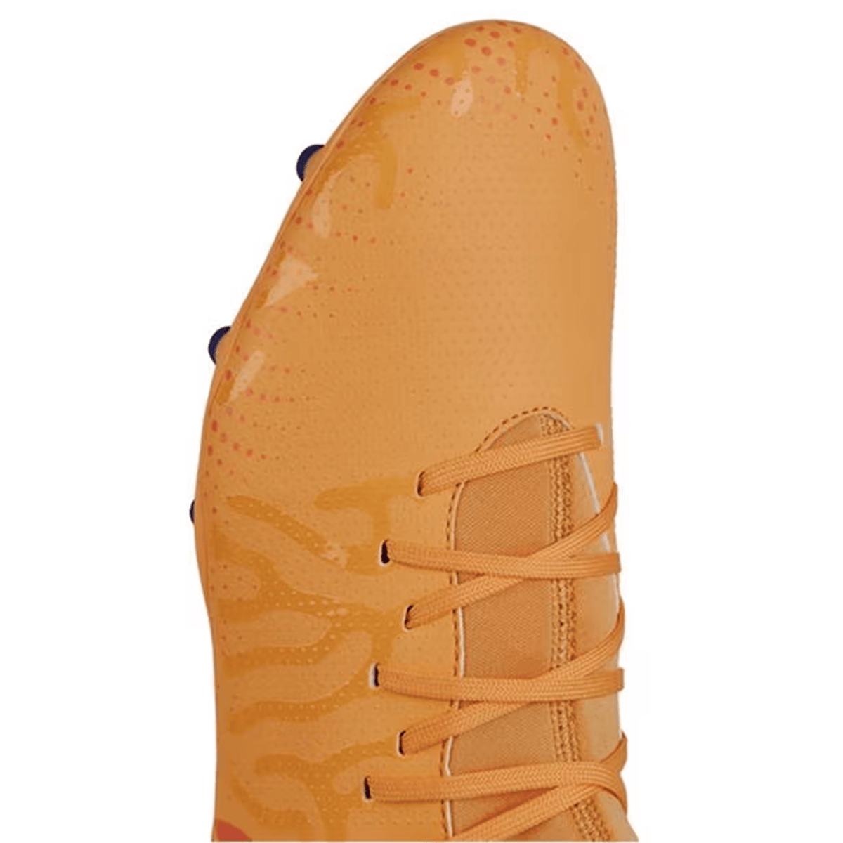 Close-up view of a Canterbury Speed Infinite Team FG soccer cleat in Amber Yellow, Orange Crush, and Mars Dust color scheme, featuring a textured surface, lightweight construction, orange laces, and orange and red accents on the toe area.