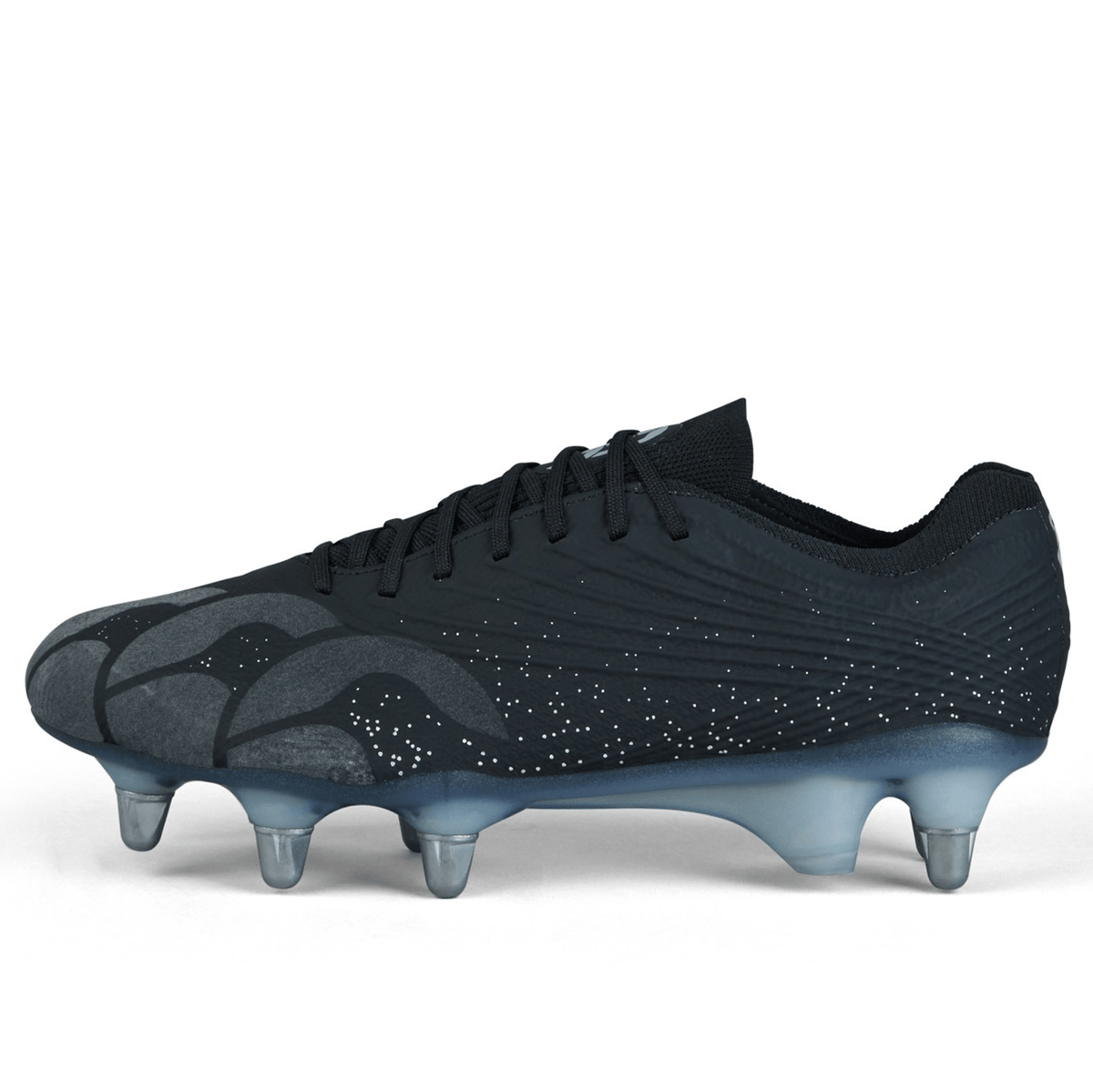 The Canterbury Stampede Groundbreak Elite SG - Black/Silver Metallic is a stylish soccer cleat featuring a black design with silver metallic accents. It has three conical studs at the front and one at the heel, along with a dotted pattern and wave-like design. This cleat is compatible with the WRS M5 Stud Kit for easy stud replacement.