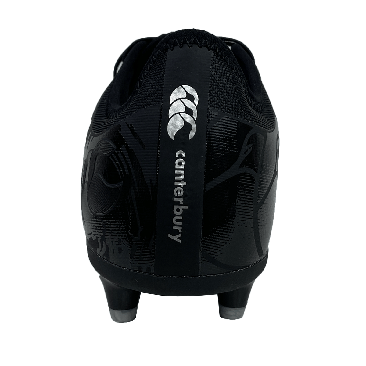 Close-up rear view of a black and silver metallic Canterbury Phoenix Genesis Pro FG rugby boot with molded studs, prominently featuring the Canterbury brand logo and name. The firm-ground design integrates TPU-reinforced mesh for enhanced durability and performance.