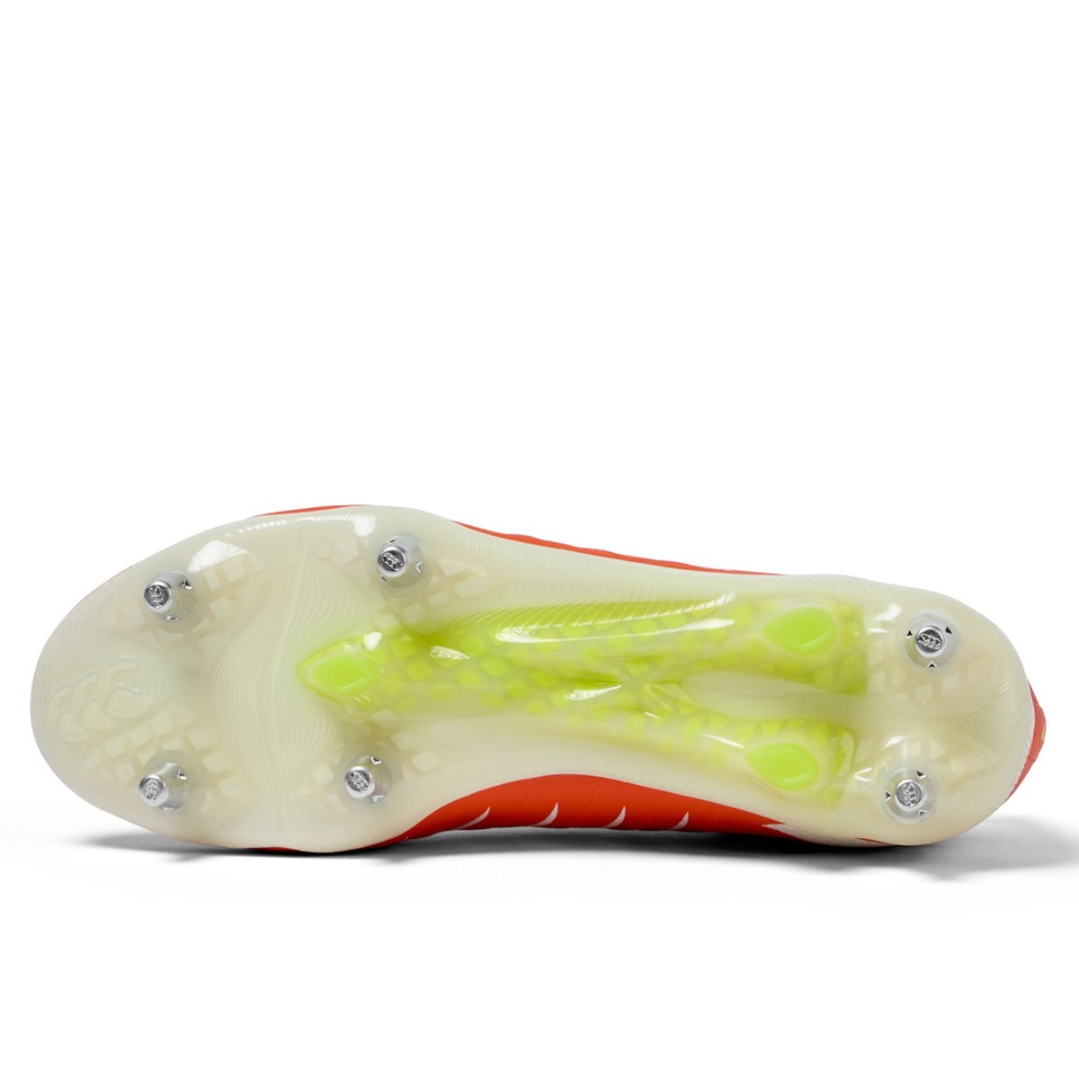 The Canterbury Phoenix 2.0 Elite SG in Tangerine Tango/Snow White features a translucent yellow sole with six metal studs on its orange underside, providing top traction for elite field performance.