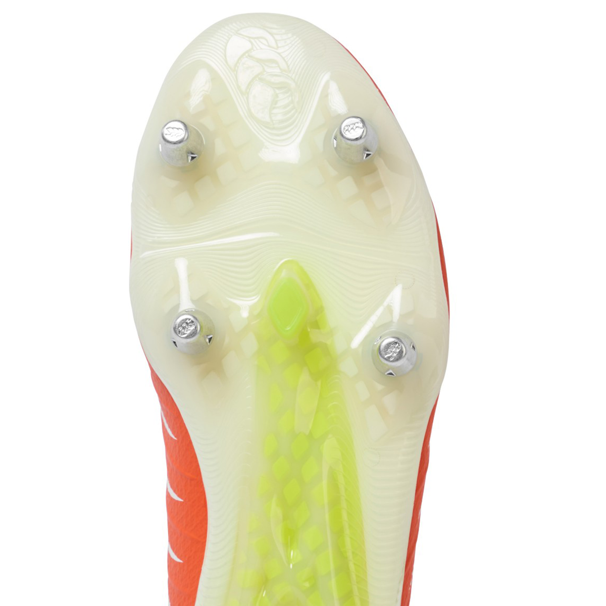 Close-up of the Canterbury Phoenix 2.0 Elite SG rugby boot sole, featuring four metal studs and a textured, translucent design with tangerine tango and snow white accents—ideal for soft ground play.
