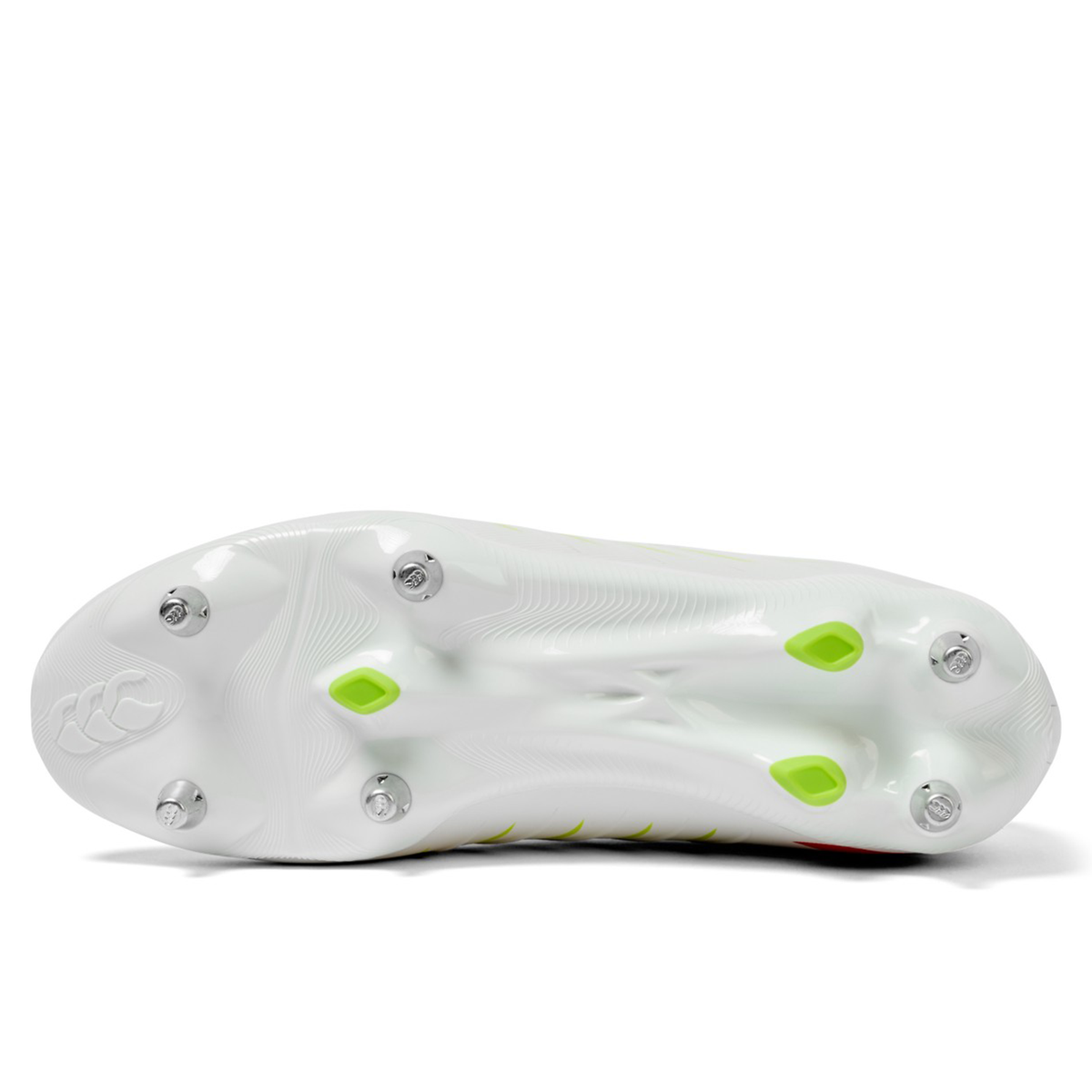 The image shows the sole of a Canterbury Phoenix 2.0 Pro SG rugby boot in Snow White/Tangerine Tango, with six metal studs, a textured surface, and the Canterbury logo on the left side.