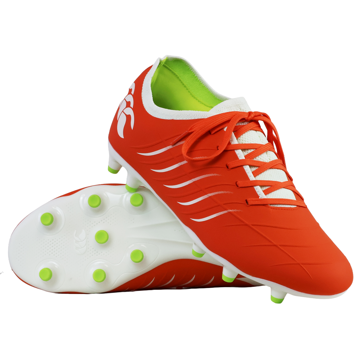 A pair of Canterbury Phoenix 2.0 Pro FG soccer cleats in Tangerine Tango/Snow White, one upright and one sole up to display the green-studded bottom.