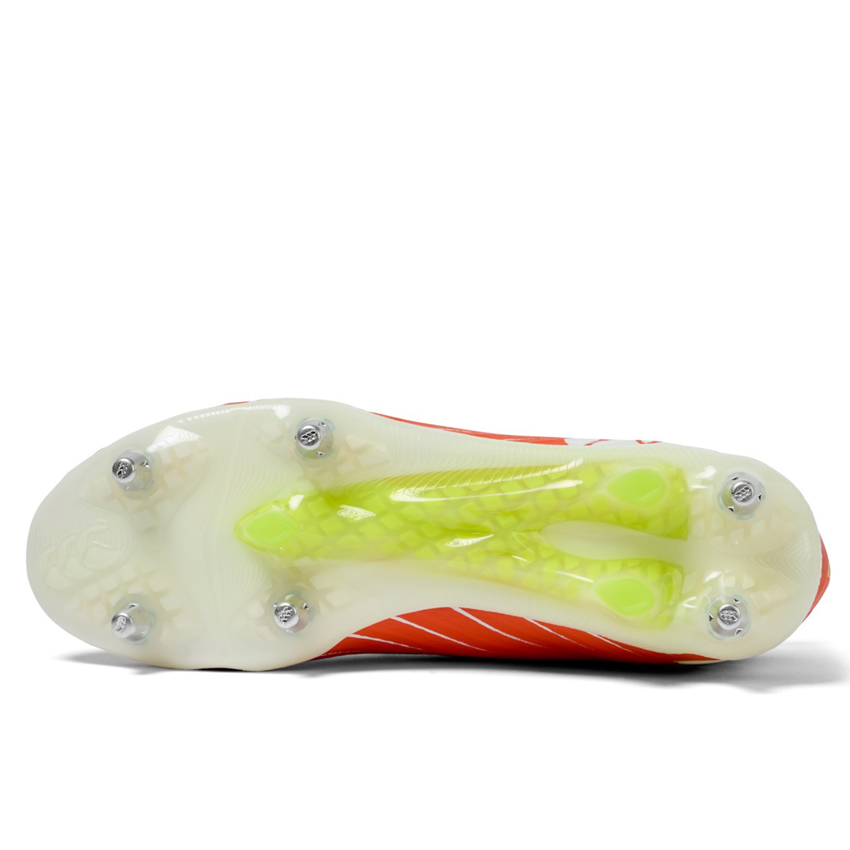 Bottom view of the Canterbury Speed Falcon Elite SG rugby boots in Tangerine Tango/Snow White, featuring a translucent soleplate with metal studs and a central yellow support – ideal for soft ground, by Canterbury.