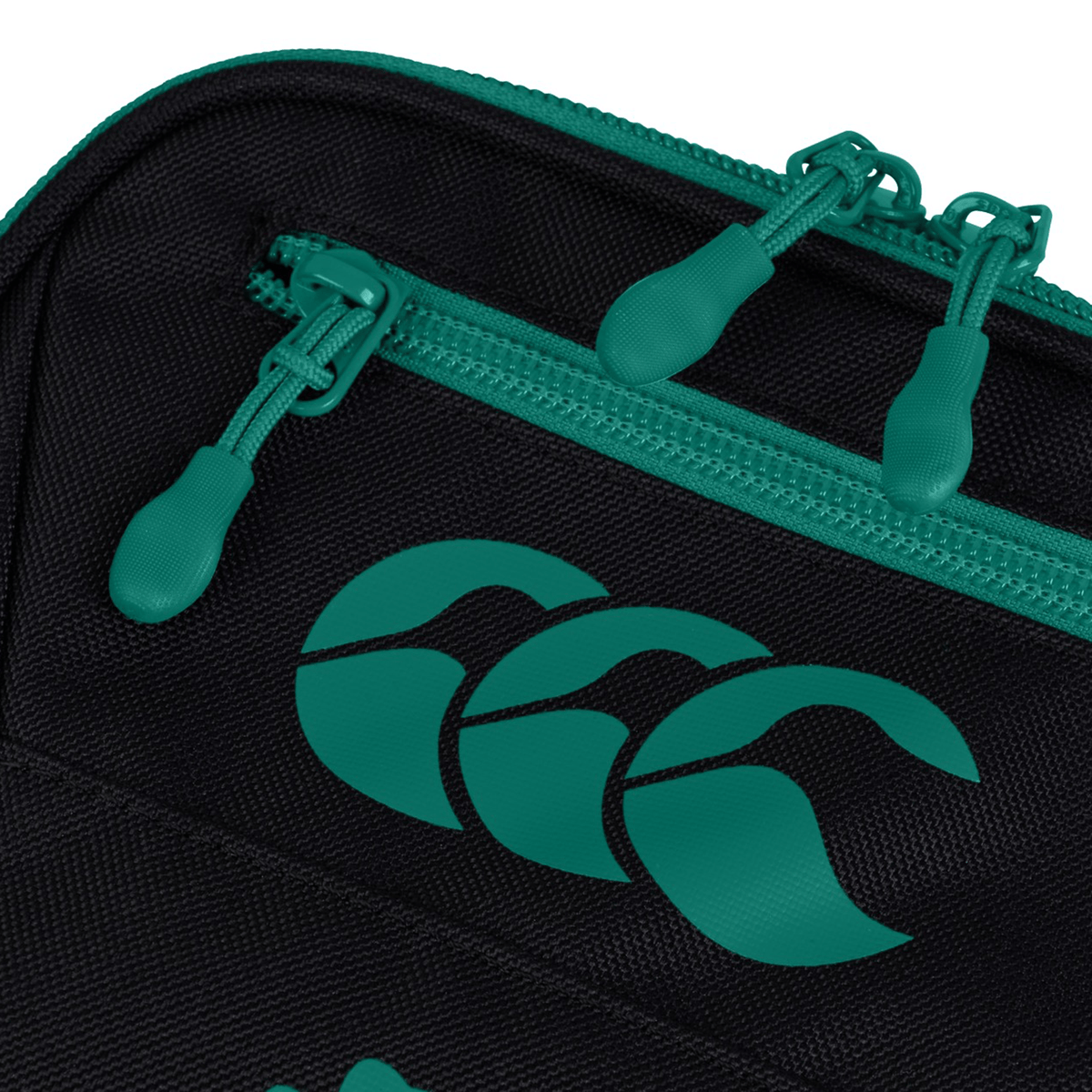 Close-up of the Ireland 25/26 Bootbag by Canterbury in black, featuring teal zippers and a teal Canterbury triple-curve logo.