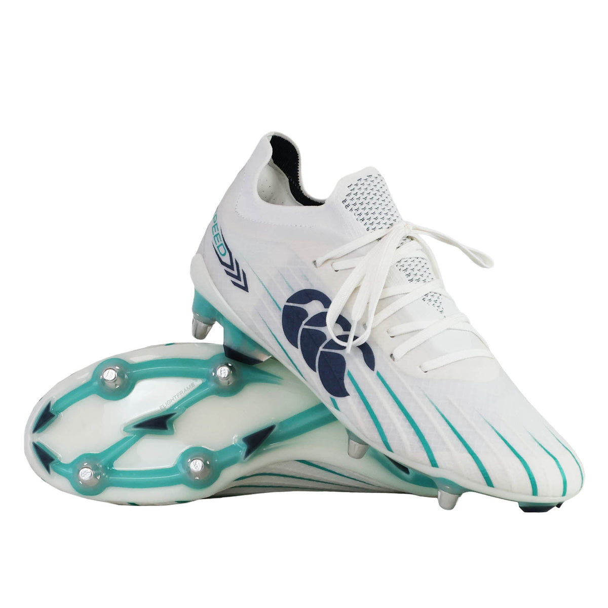A pair of Canterbury Speed Falcon 2.0 Elite SG rugby boots in White/Baltic Green, with one boot upright and the other on its side to display the soft ground sole and studs.