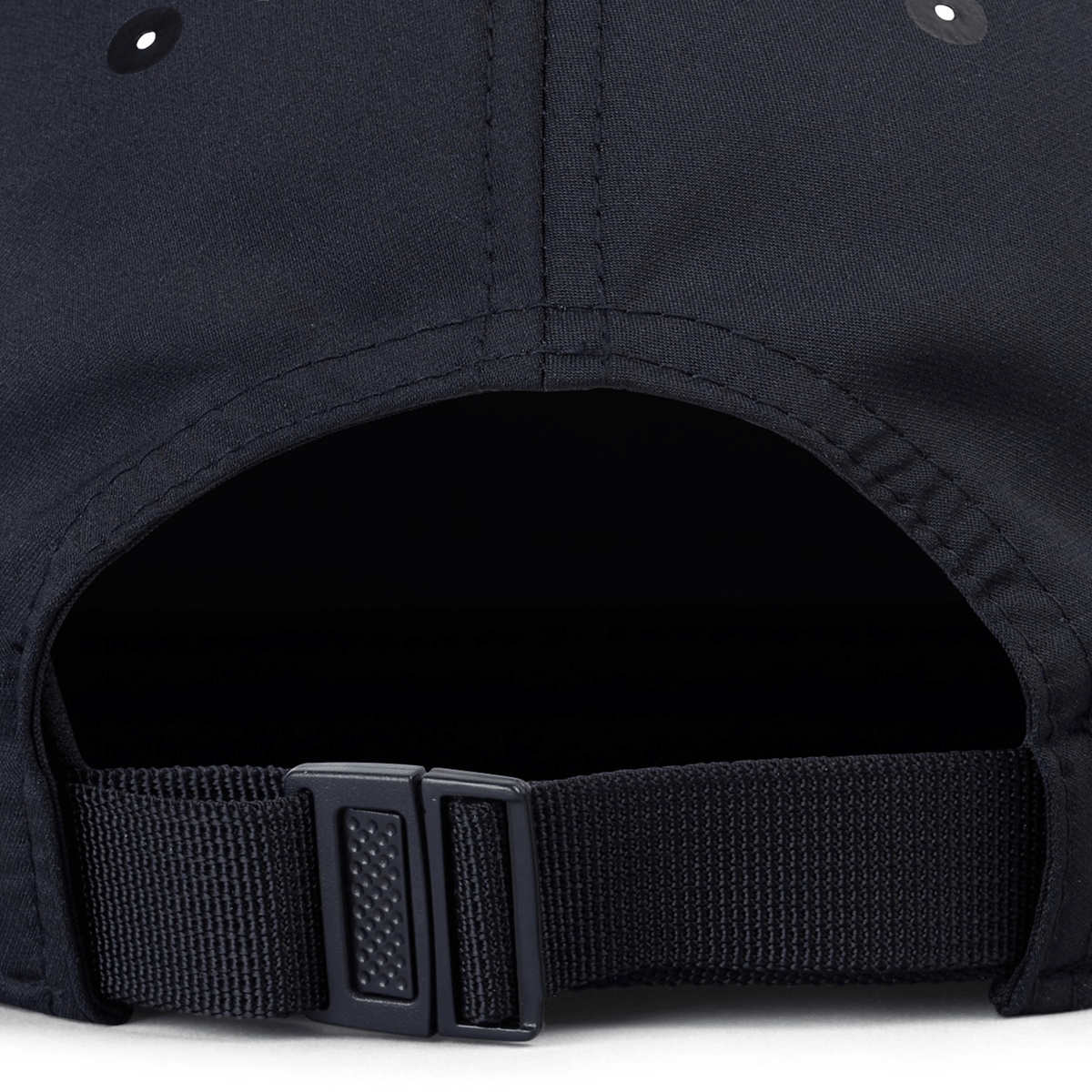 Close-up of the Ireland 25/26 Tech Logo Cap by Canterbury, an adjustable sports cap featuring a plastic buckle strap and stitched eyelets for comfort.
