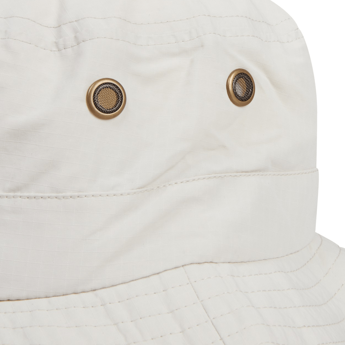 Close-up of the British &amp; Irish Lions 2025 Outback Wide Brim Bucket Hat by Canterbury in beige, showcasing two metal eyelets on the side. Crafted from quick-dry ripstop polyester, it captures the adventurous spirit reminiscent of the British &amp; Irish Lions.
