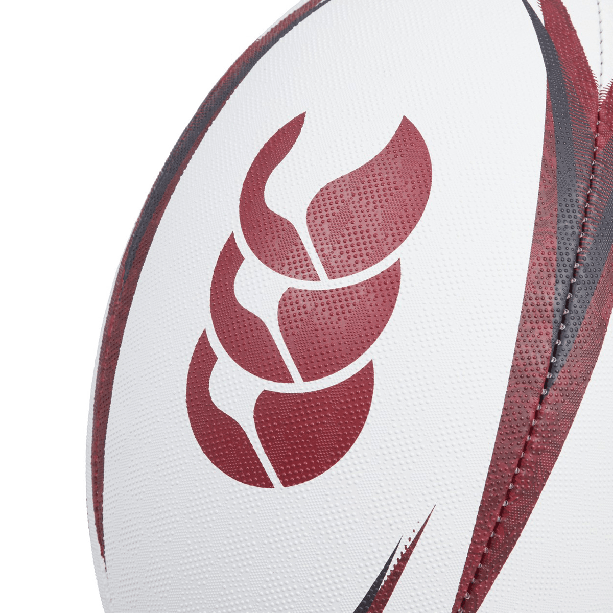 Close-up of the British &amp; Irish Lions 2025 Mentre Sponsor Ball by Canterbury, crafted from synthetic rubber and featuring a red and white design with an emblem reminiscent of the British &amp; Irish Lions crest.